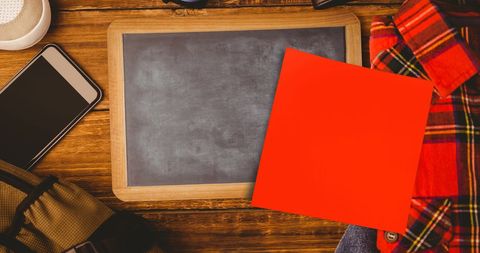 Blank Red Memo Note on Desk with Blackboard Background - Download Free Stock Images Pikwizard.com