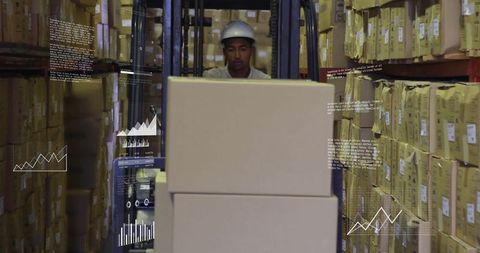 Warehouse worker operating forklift amidst technology-focused storage