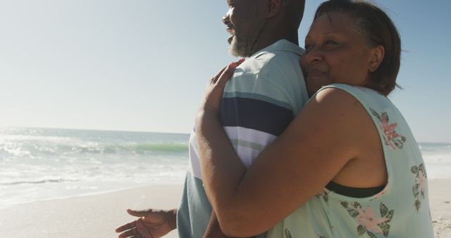 Senior African American Couple Embracing on a Beach - Download Free Stock Images Pikwizard.com