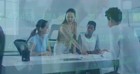 Diverse Business Team Analyzing Financial Data for Growth Strategy