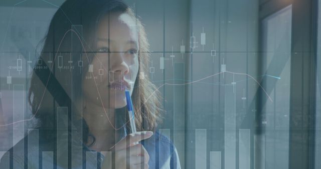 Pensive Businesswoman Analyzing Financial Data Trends in Modern Office - Download Free Stock Images Pikwizard.com