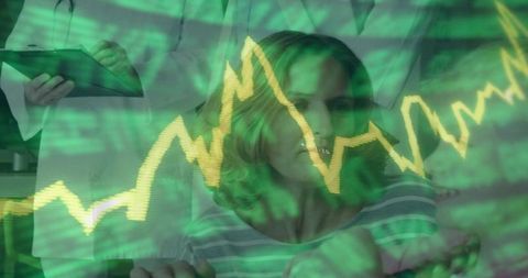 Mature woman receiving bedside medical consultation with dynamic ecg graph overlay