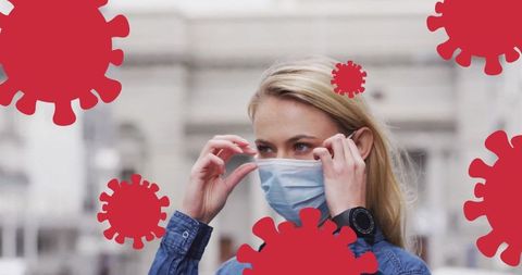 Woman Wearing Face Mask Surrounded by Digital Virus Icons