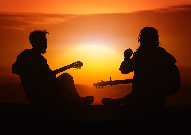 This scene captures the peaceful and artistic moment of two guitarists playing during sunset near the ocean. Ideal for promoting musical events, beach vacations, travel blogs, leisure activities, and lifestyle promotions. It conveys relaxation, camaraderie, and passion for music, suitable for posters or social media covers.