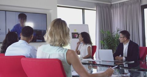 Diverse Team Engaged in Video Conference Meeting in Modern Office - Download Free Stock Images Pikwizard.com