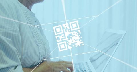 Businesswoman Typing on Laptop with Futuristic QR Code Overlay