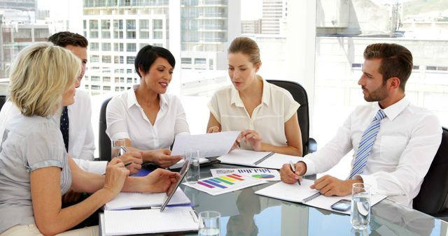 Team Working Together in Modern Office Conference Room Analyzing Business Reports - Download Free Stock Images Pikwizard.com