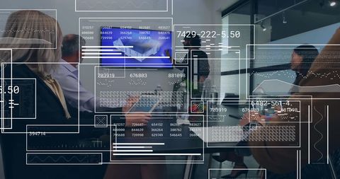 Team collaborating over financial data in modern office