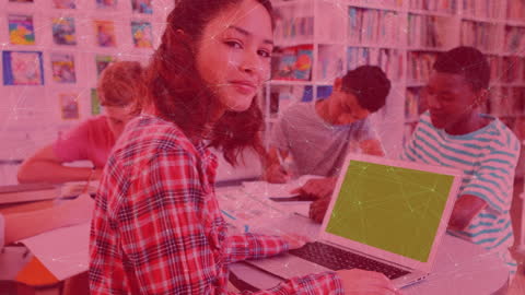 Diverse Students Engaged in Technology-Based Lesson in Library