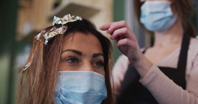 Woman Wearing Mask Having Hair Highlighted at Salon - Download Free Stock Images Pikwizard.com