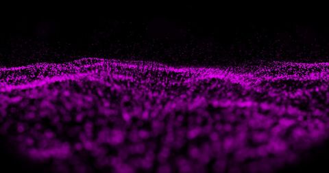 Shimmering Purple Particles in Hypnotic Motion on Black Background