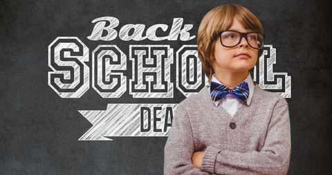 Confident schoolboy in glasses ready for new school year