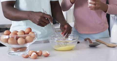 Couple Whisking Eggs in Modern Kitchen for Homemade Breakfast - Download Free Stock Images Pikwizard.com