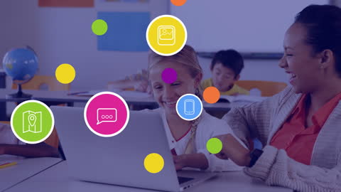 Teacher and Student Using Computer for Interactive Learning