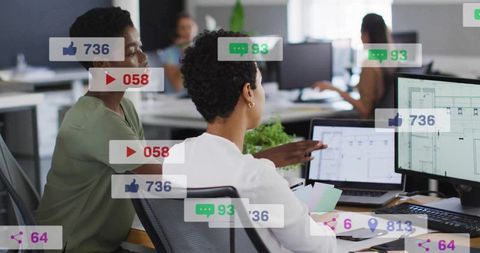 Business Team Collaborating on Design in Modern Office with Social Metrics