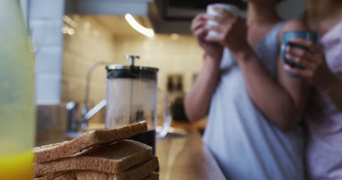 Loving Same-Sex Couple Enjoying Morning Coffee Together
