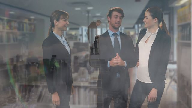 Group of business professionals conversing in a sleek modern office with superimposed cityscape, suggesting global collaboration and urban success. Suitable for use in corporate presentations, business websites, and teamwork promotional materials.