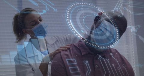 Masked clinician palpating patient in maroon shirt under augmented reality hud