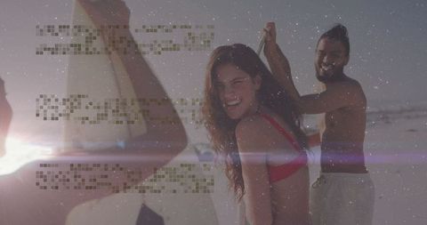 Joyful Group Enjoying Refreshing Beach Day with Surfboards