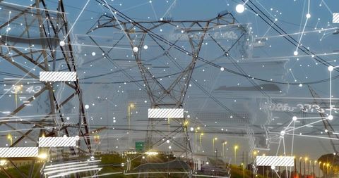 High-voltage transmission tower with digital network overlay above dusk highway corridor