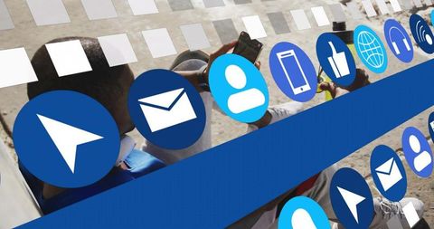 Man sitting on park bench using smartphone with floating blue app icons for mobile connectivity