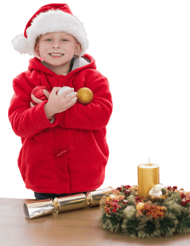 Smiling Boy in Santa Hat Holding Christmas Decorations with Transparent Background - Download Free Stock Videos Pikwizard.com