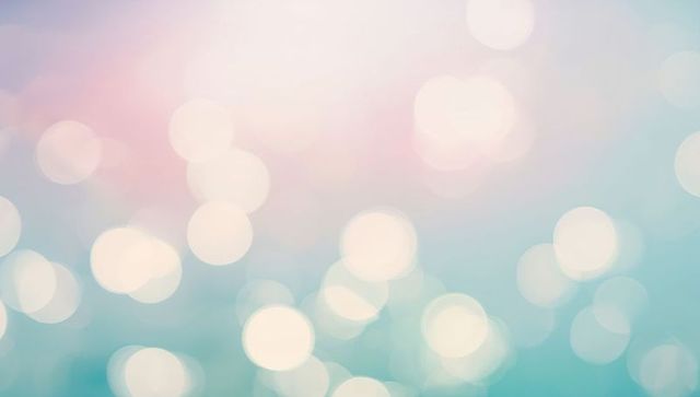 Glowing Pastel Bokeh with Dreamy Luminous Orbs and Soft Aqua-Pink Gradient