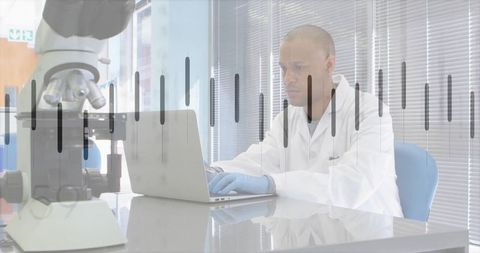 Researcher analyzing data in modern laboratory