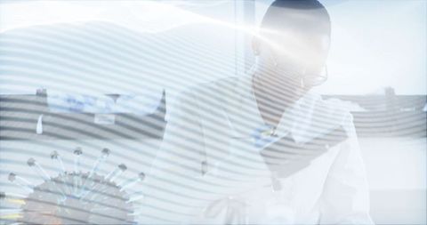 Lean female scientist inspecting lab bench with virus model, backlit clinical research