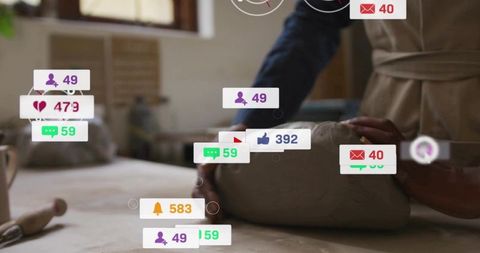 Artisan baker kneading dough on wooden table with live social media notification overlays