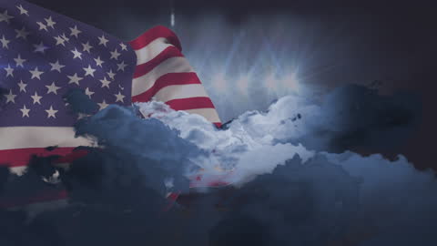 Waving American Flag with Moving Clouds and Floodlights
