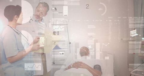 Medical Professionals with Digital Interface in Hospital Room
