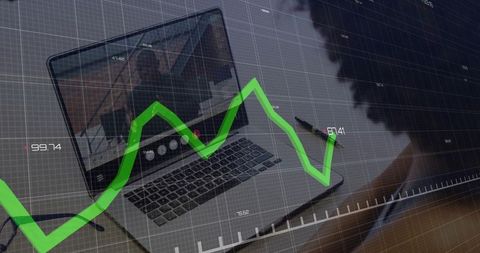 Green line graph overlaid on laptop in home office