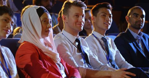 Diverse Business Professionals Engaged in Symposium