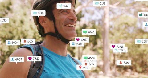 Cyclist enjoying nature with digital interaction icons