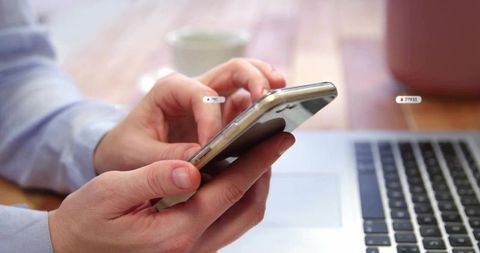 Tapping Smartphone Over Laptop While Working Remotely, Hands Using Mobile for Productivity