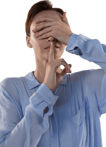 Mysterious Businesswoman Gesturing Silence with Finger