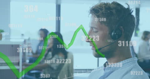 Caucasian Businessman with Headset Analyzing Data in Modern Office