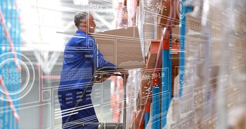 Warehouse Worker Retrieving Box with Data Analytics Overlay