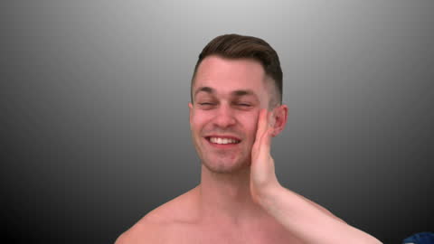 Smiling Man Playfully Receiving Slap with Joy in Slow Motion
