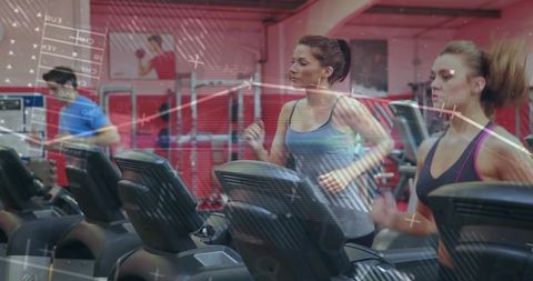 Women Running on Treadmills in Gym Cardio Area with HUD Overlay, Group Training