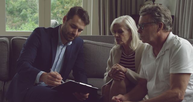 Financial Advisor Meeting with Senior Couple in Living Room - Download Free Stock Images Pikwizard.com