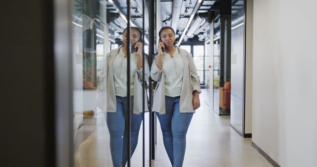 Businesswoman Making Important Phone Call in Modern Office Reflection - Download Free Stock Images Pikwizard.com