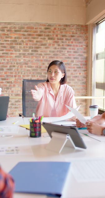 Businesswoman Leading Meeting in Modern Office - Download Free Stock Images Pikwizard.com