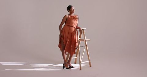 Elegant indian woman in minimalist studio environment