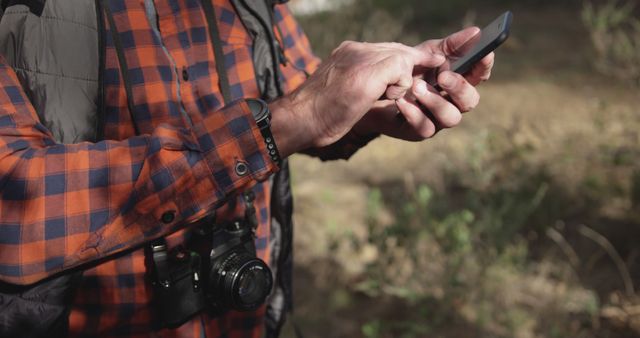 Man Using Smartphone Outdoors for Navigation with Camera - Download Free Stock Images Pikwizard.com