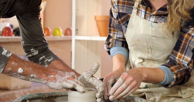 Man and Woman Sculpting Pottery Together in Studio - Download Free Stock Images Pikwizard.com