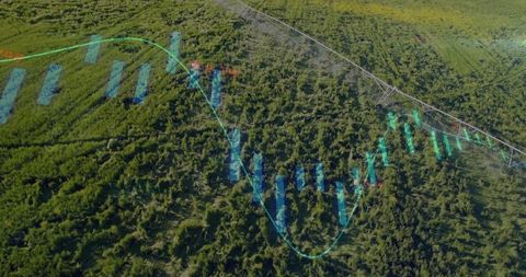 Aerial view of crop field with financial data visualization