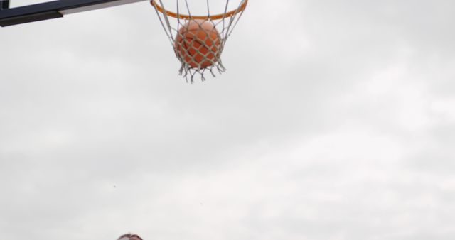 Basketball Mid-air below Hoop Aim Sky Background - Download Free Stock Images Pikwizard.com