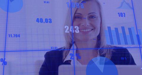 Caucasian businesswoman analyzing digital data on laptop